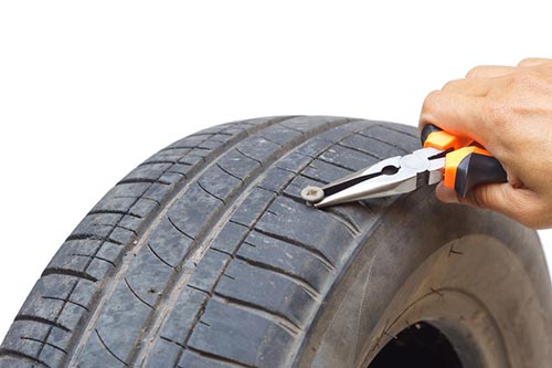 What to Do if You Find a Nail in Your Tire - T3 Atlanta